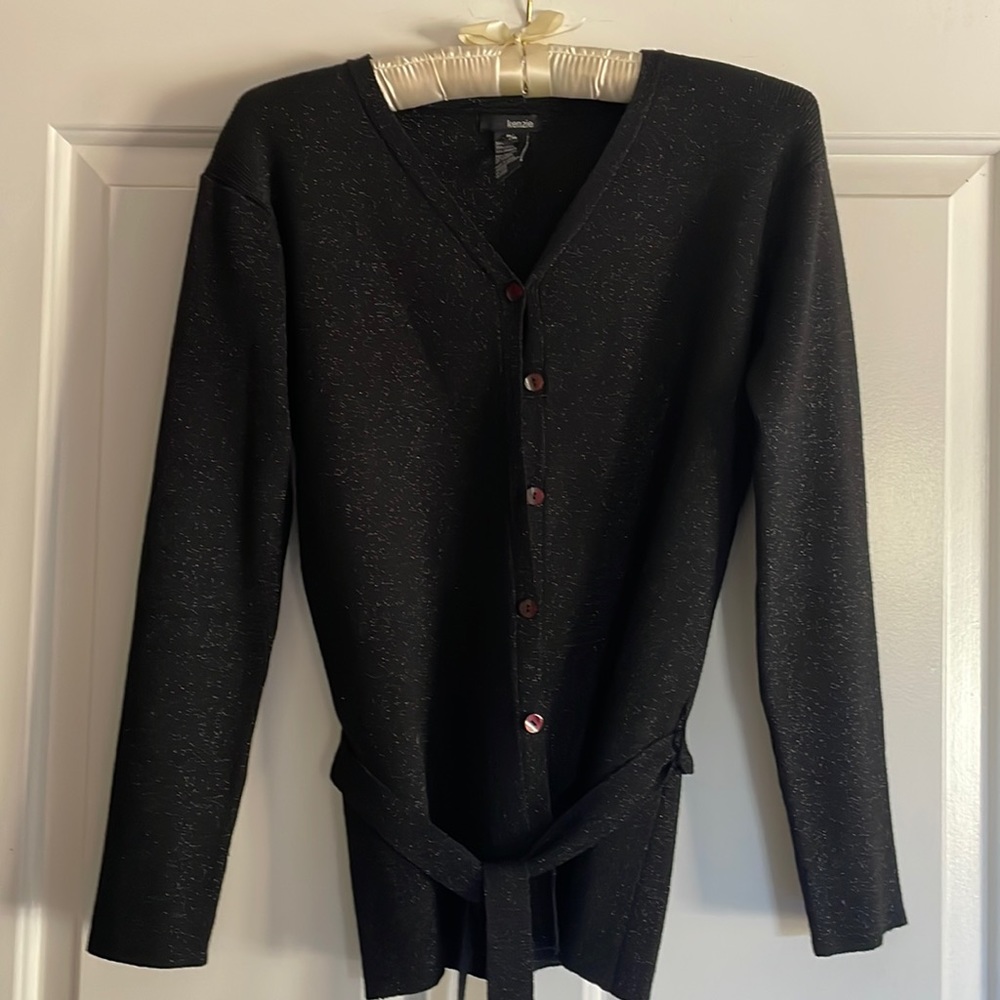 Beautiful Kenzie sweater black with shiny material can be dressed up size medium